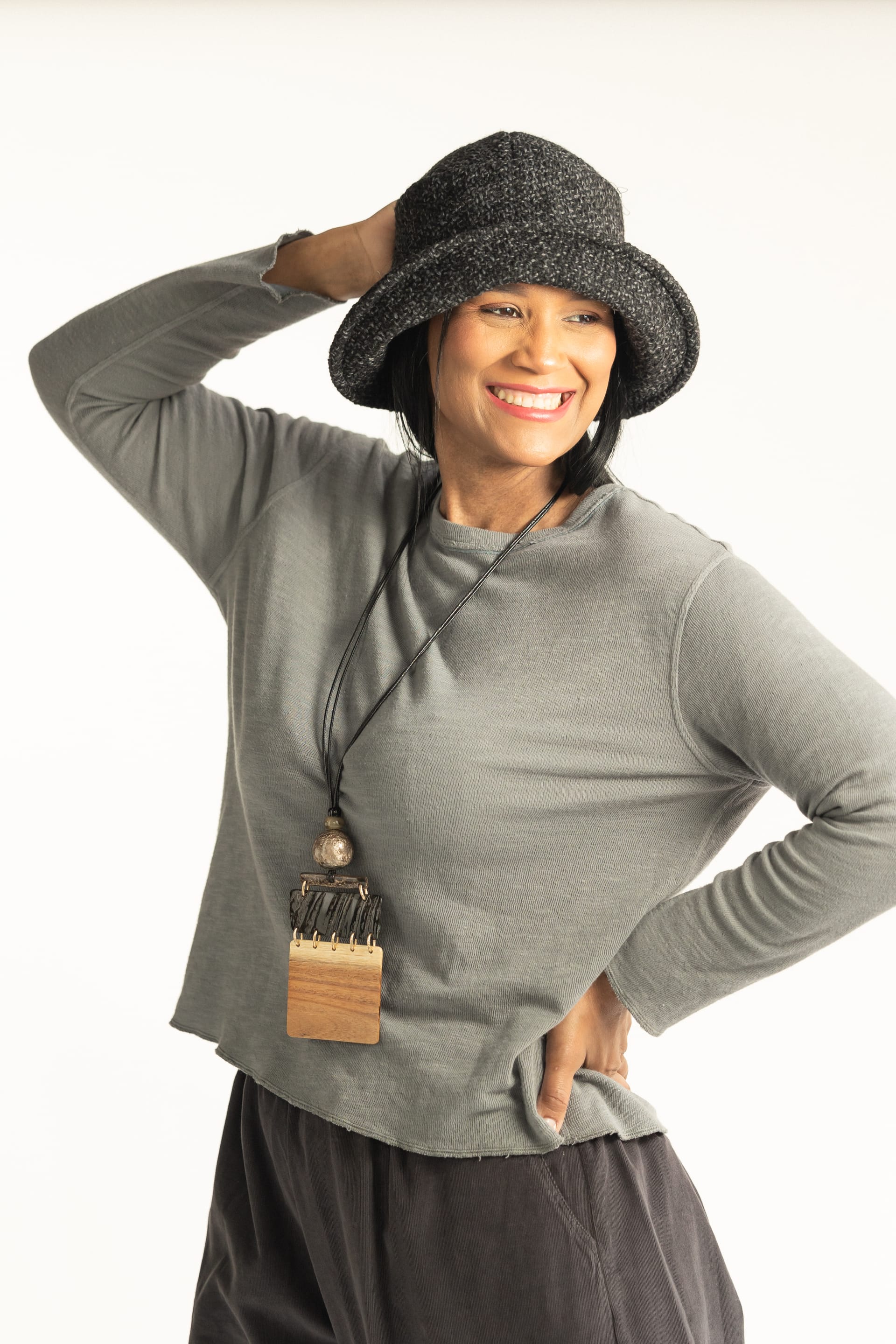 Model wearing a gray hat and casual outfit at Simple Life Seattle