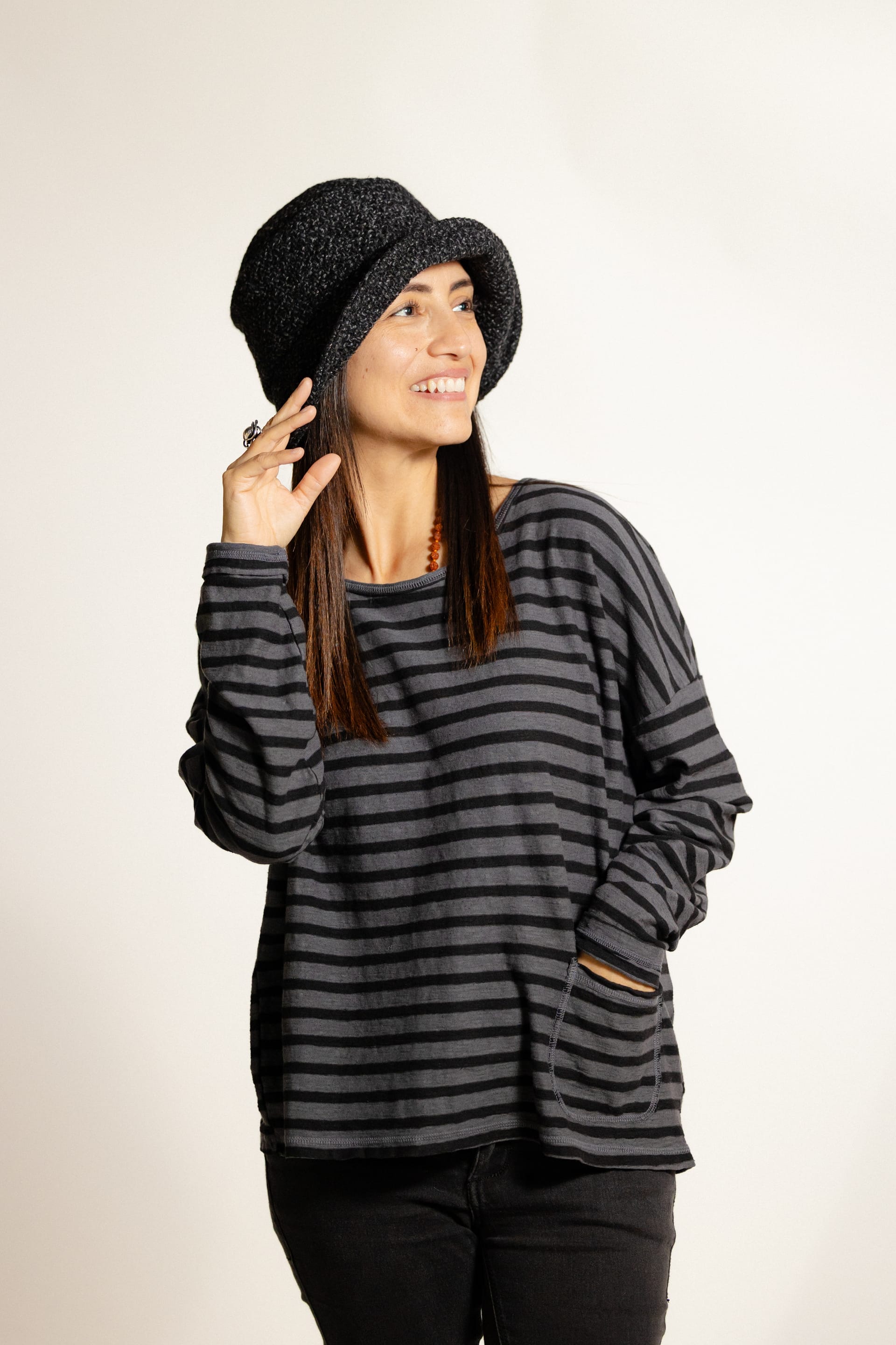 Woman wearing tweed bucket hat fashion look