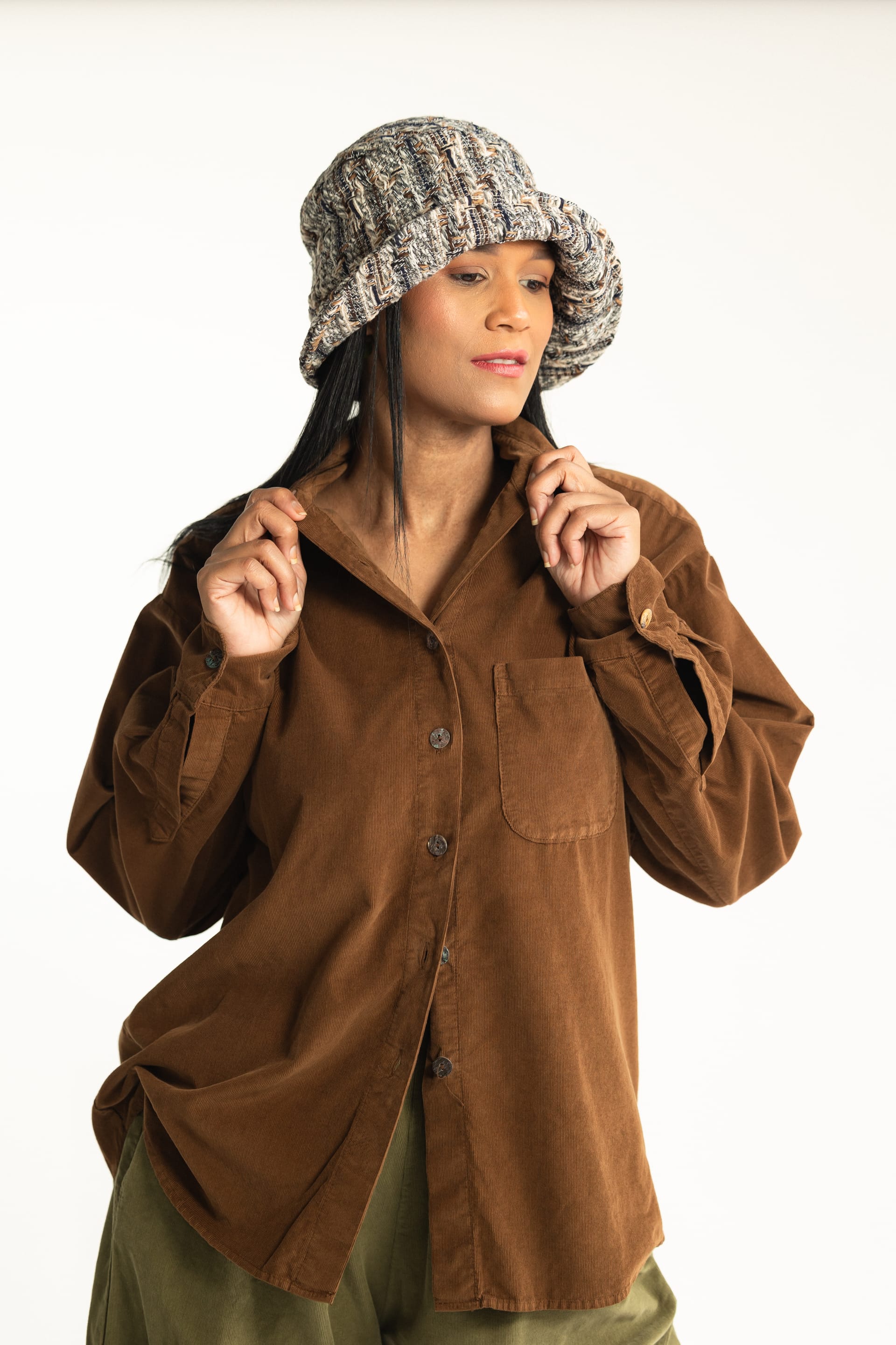Woman in striped top with knit hat