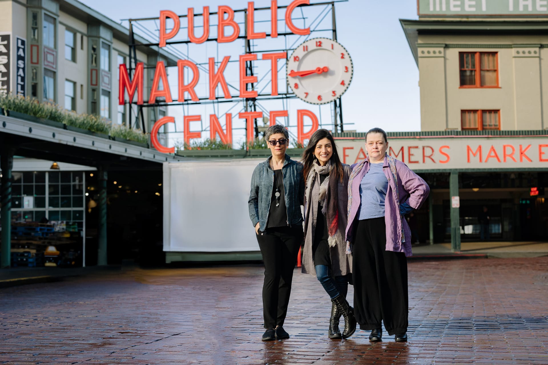 Pamela, Erica, and Tammy together at Pike Place Market in Seattle